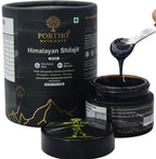 women shilajit , spoon holding black shilajit 