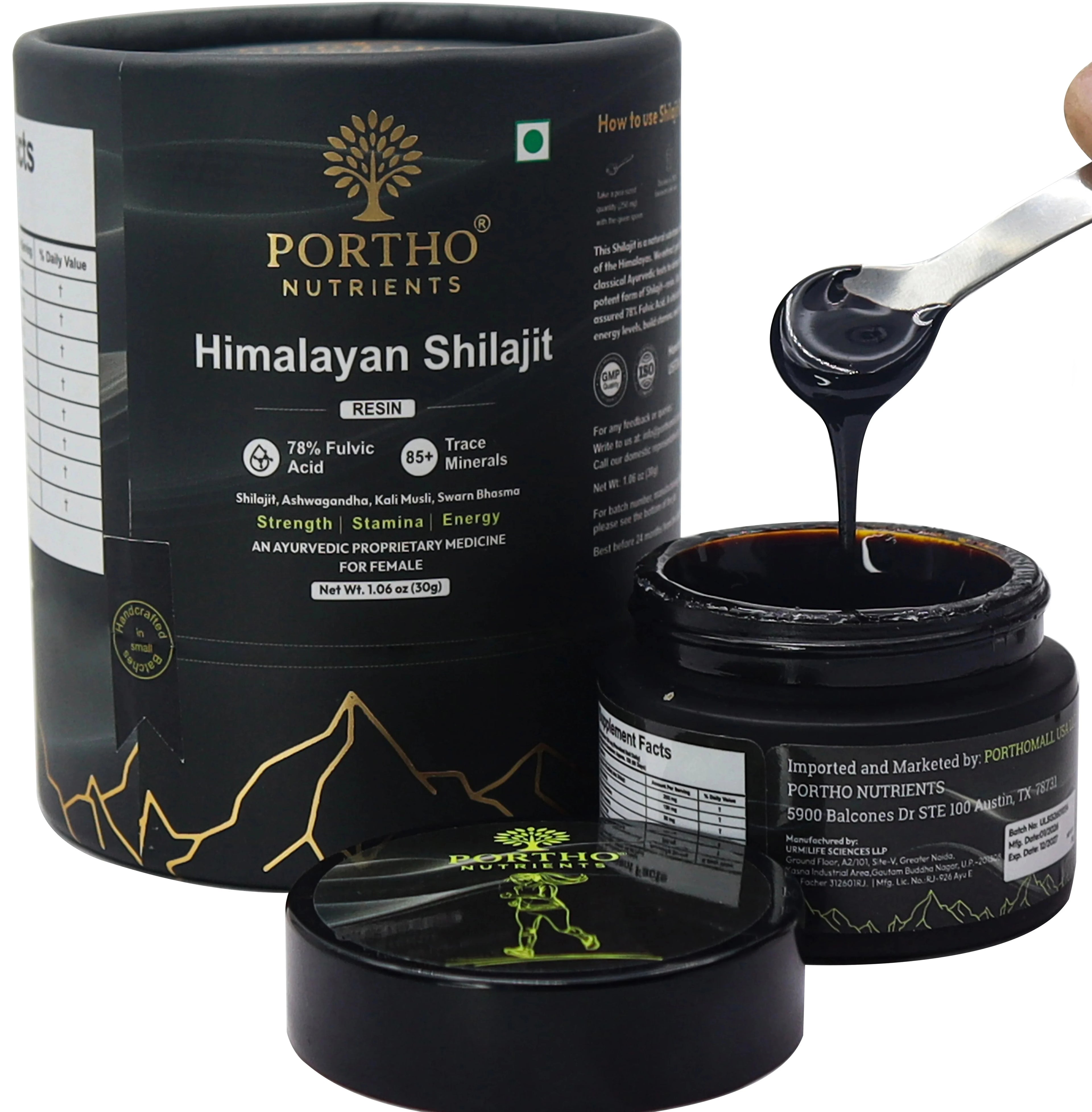 women shilajit , spoon holding black shilajit 